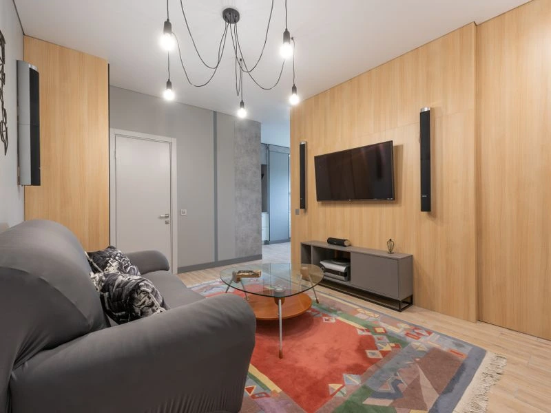Wall-mounted surround sound speakers integrated into a home cinema room - Maryland