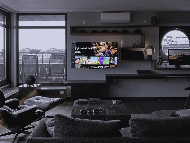 Modern entertainment room with wall mounted screens