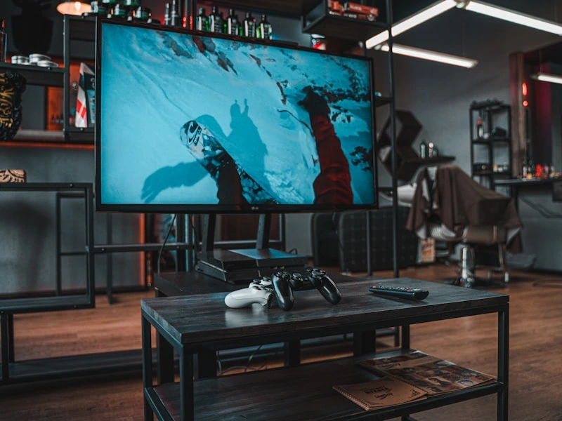 Modern entertainment room with big screen and seating