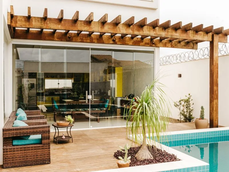 Screened poolside terrace at a modern villa