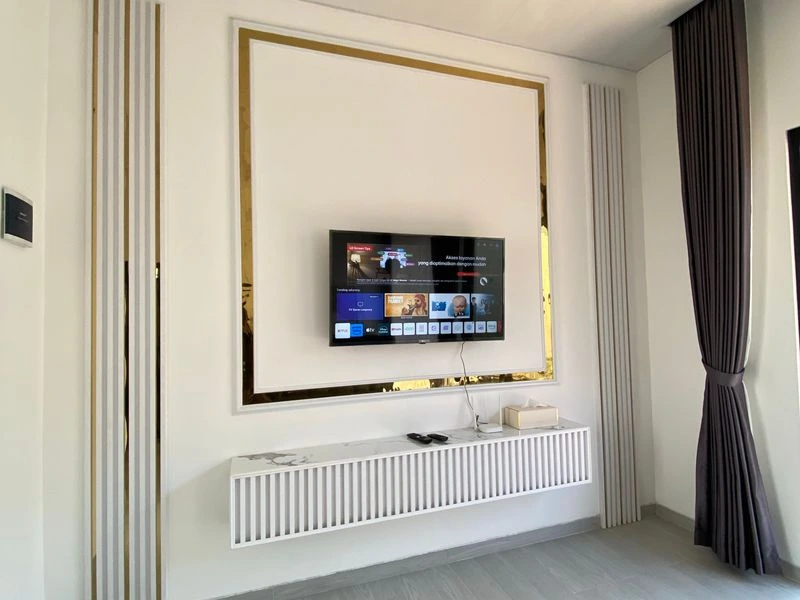 Home theater room with integrated speakers and AV equipment - Chevy Chase